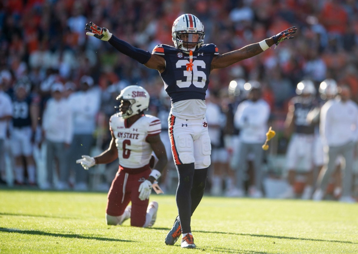 Auburn Tigers defensive back Jaylin Simpson (36) celebrates before being called for defensive pass interference call during the first quarter as Auburn Tigers take on New Mexico State Aggies at Jordan-Hare Stadium in Auburn, Ala., on Saturday, Nov. 18, 2023.  